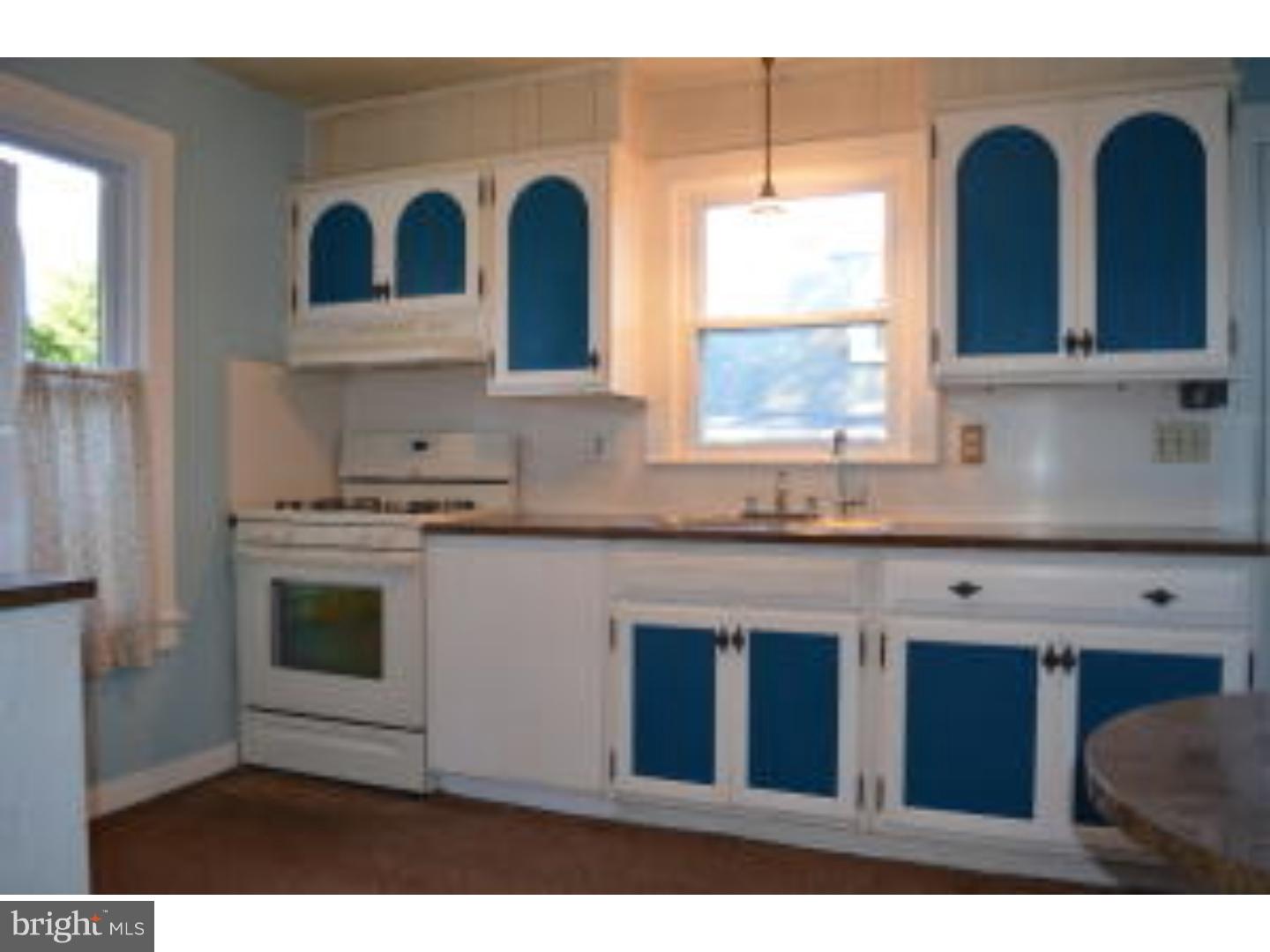 205 Old Fritztown Road Reading, PA 19607 - Photo 22 of 25 a kitchen with stainless steel appliances granite countertop a stove a sink and a microwave