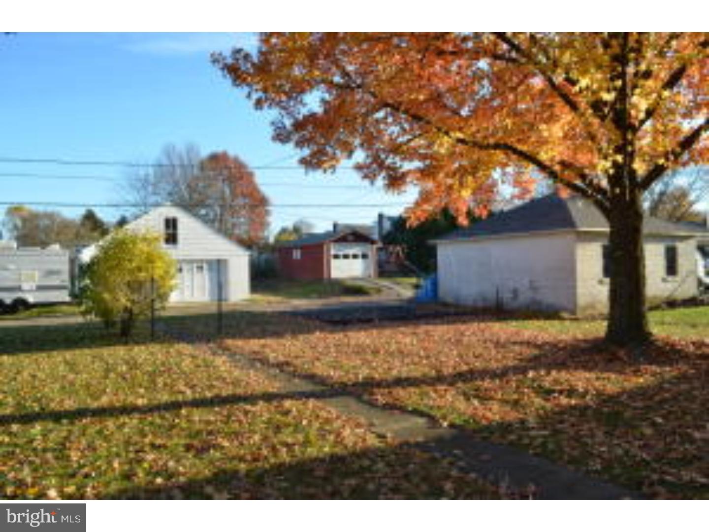 205 Old Fritztown Road Reading, PA 19607 - Photo 5 of 25 a front view of a house with a yard