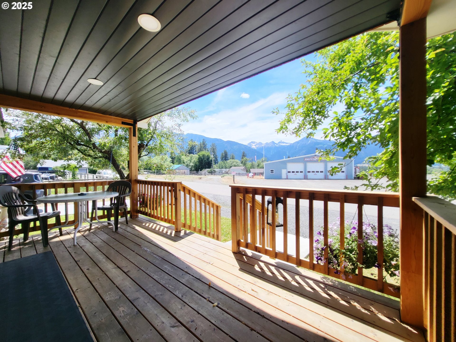204 North Russell Street Joseph, OR 97846 - Photo 2 of 46 a view of balcony with wooden floor and outdoor seating