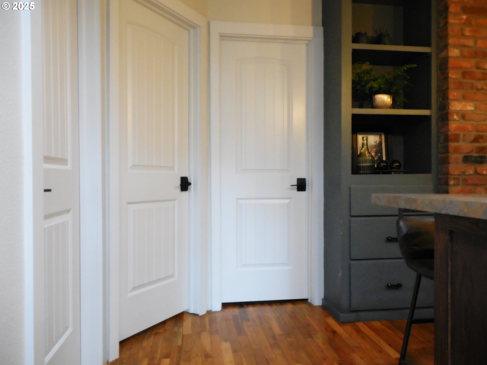 204 North Russell Street Joseph, OR 97846 - Photo 22 of 46 a view of a hallway with wooden floor and entryway