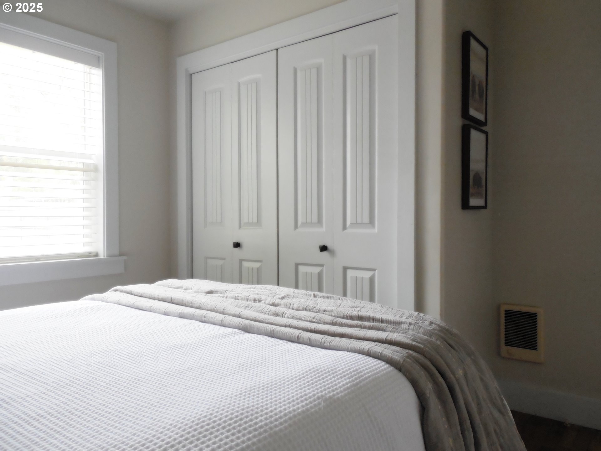 204 North Russell Street Joseph, OR 97846 - Photo 28 of 46 a bedroom with a bed and a window