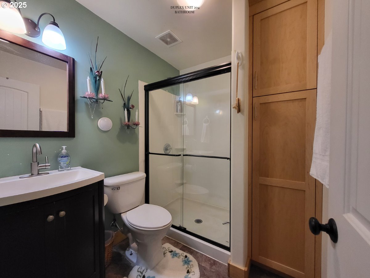 204 North Russell Street Joseph, OR 97846 - Photo 45 of 46 a bathroom with a sink a toilet and shower