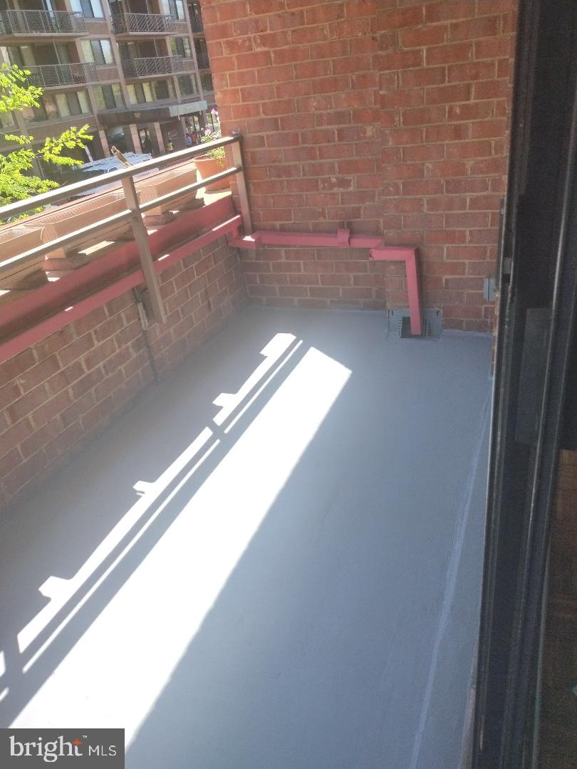 2141 P Street Northwest, Unit 202 Washington, DC 20037 - Photo 12 of 30 a view of a hallway