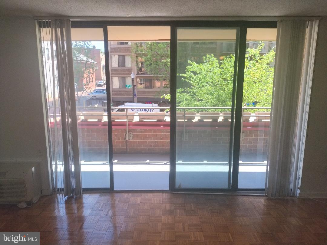 2141 P Street Northwest, Unit 202 Washington, DC 20037 - Photo 9 of 30 a view of a glass door with a glass door