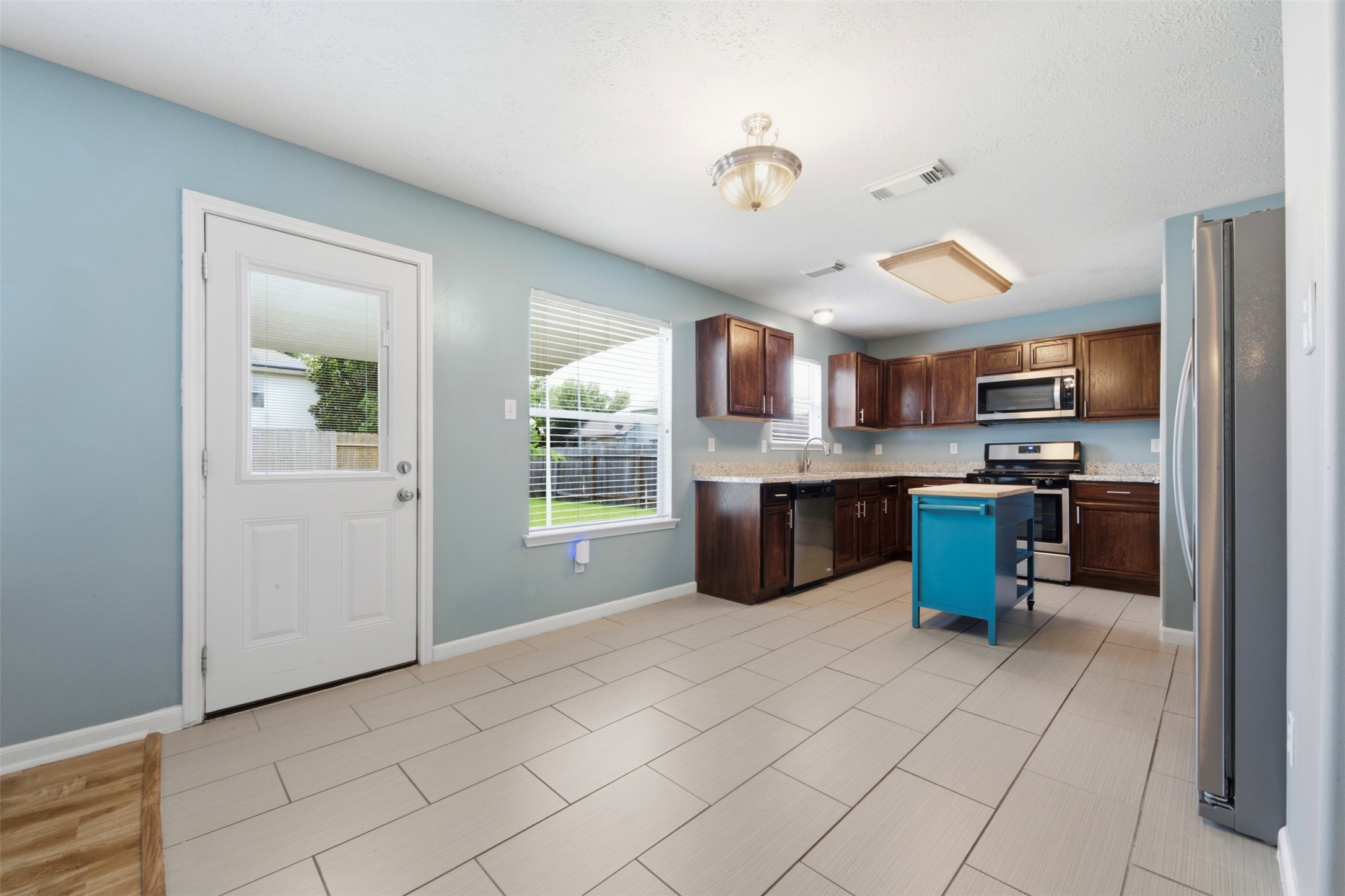 2446 Halstead Drive Spring, TX 77386 - Photo 21 of 45 Breakfast area immediately off the kitchen with quick access to the back patio & yard.