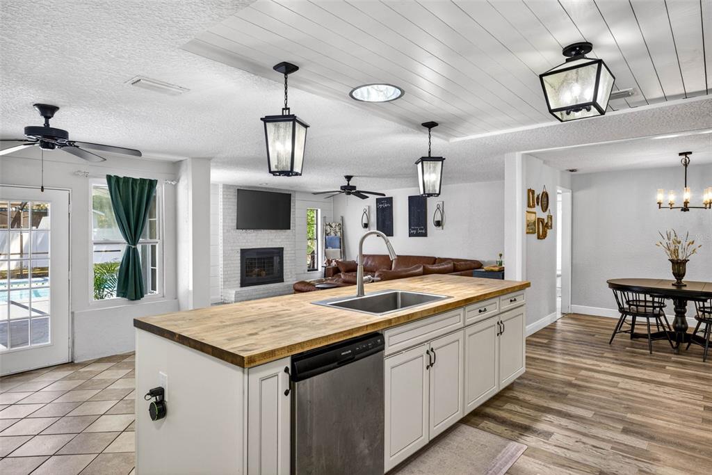 9043 Mc Cormick Street Spring Hill, FL 34608 - Photo 17 of 47 a kitchen with a sink and stove
