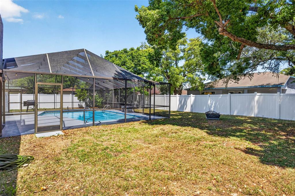 9043 Mc Cormick Street Spring Hill, FL 34608 - Photo 46 of 47 a view of a backyard