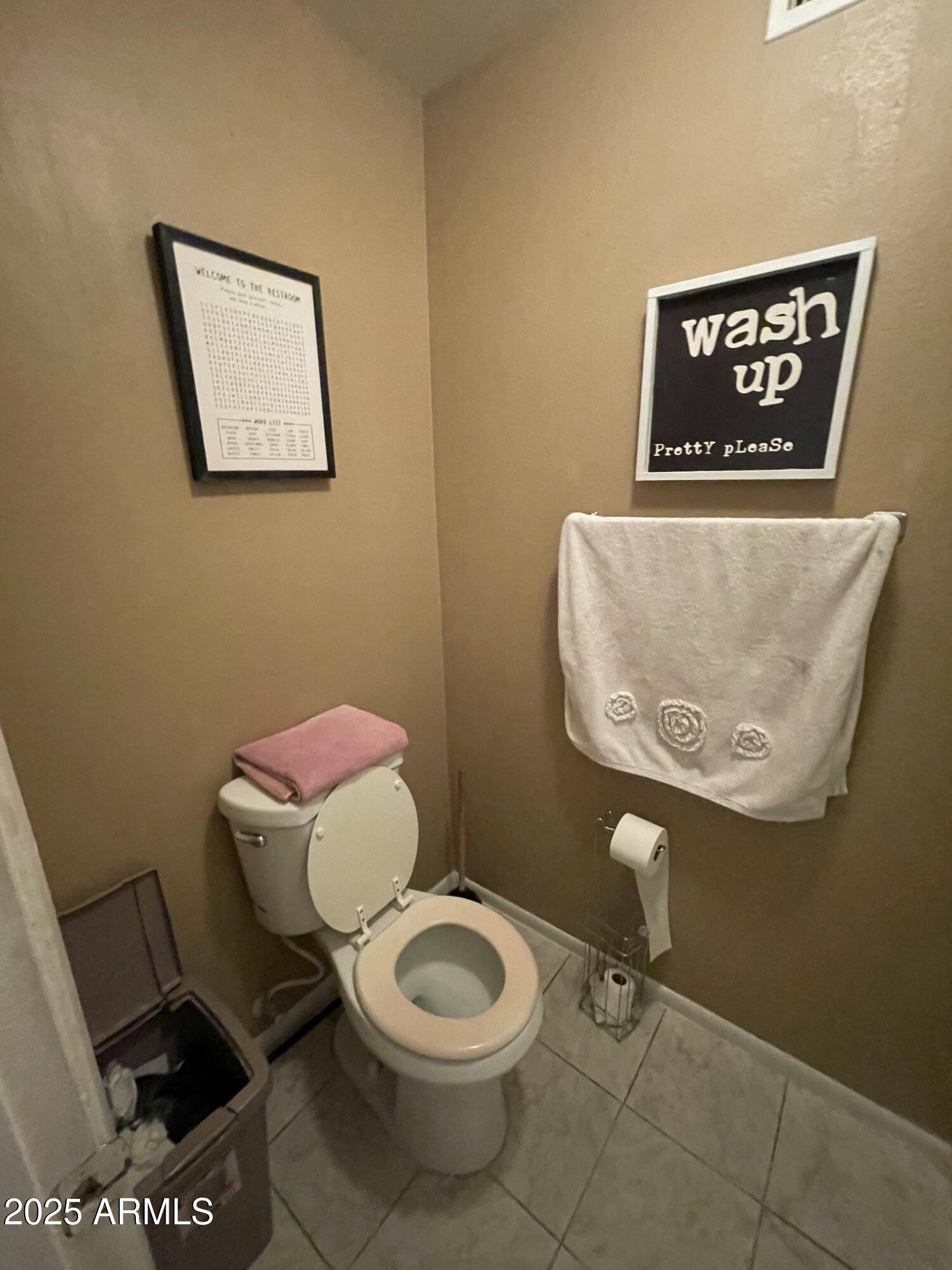 3364 West Harmont Drive Phoenix, AZ 85051 - Photo 15 of 39 a bathroom with a toilet and a sink