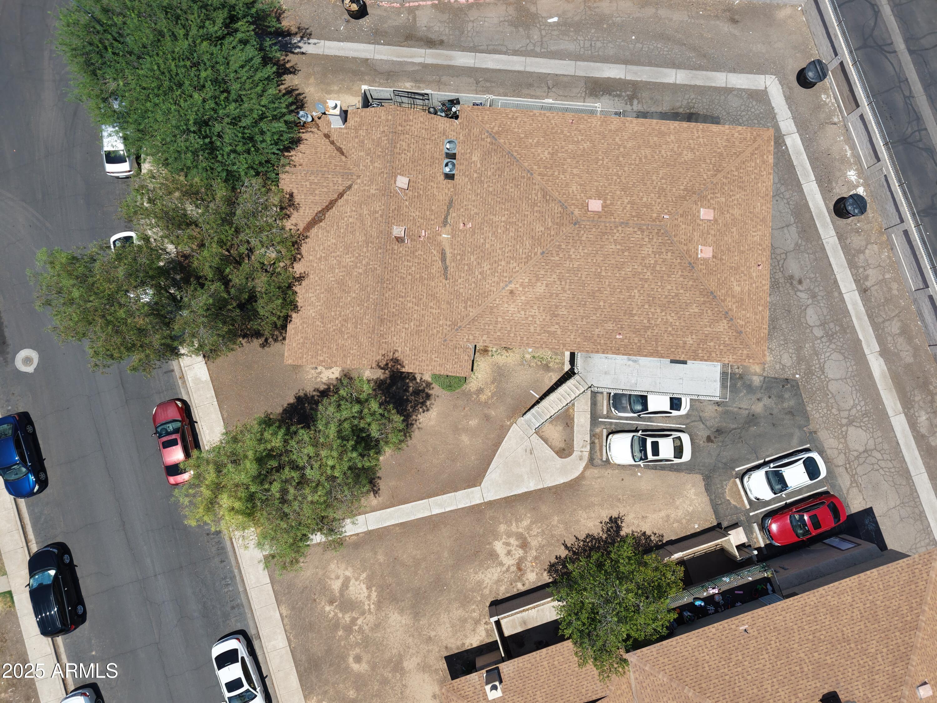 3364 West Harmont Drive Phoenix, AZ 85051 - Photo 2 of 39 an aerial view of a house