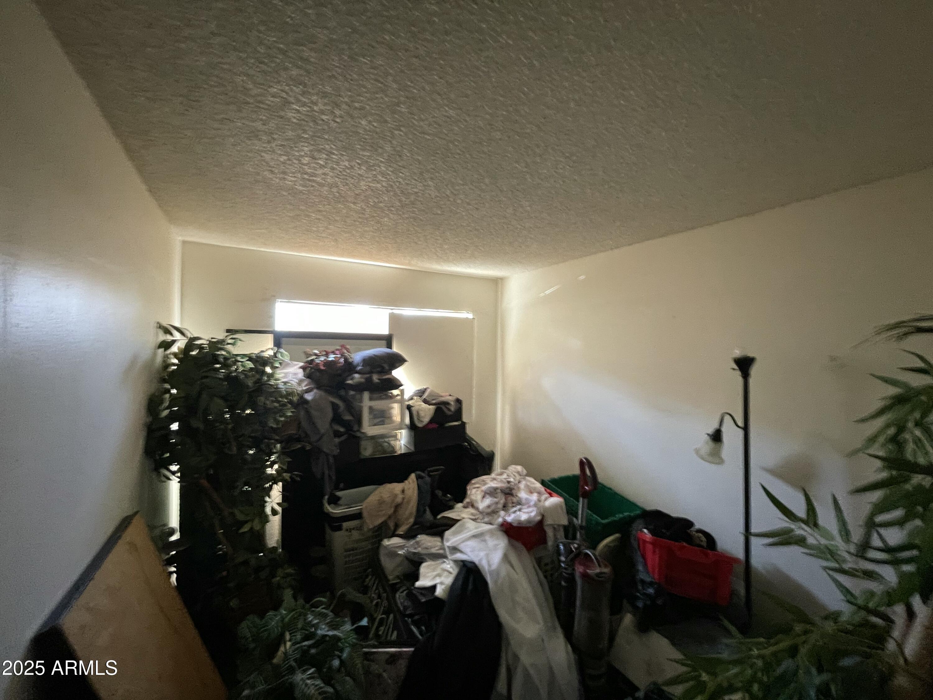 3364 West Harmont Drive Phoenix, AZ 85051 - Photo 22 of 39 a view of a room with gym equipment