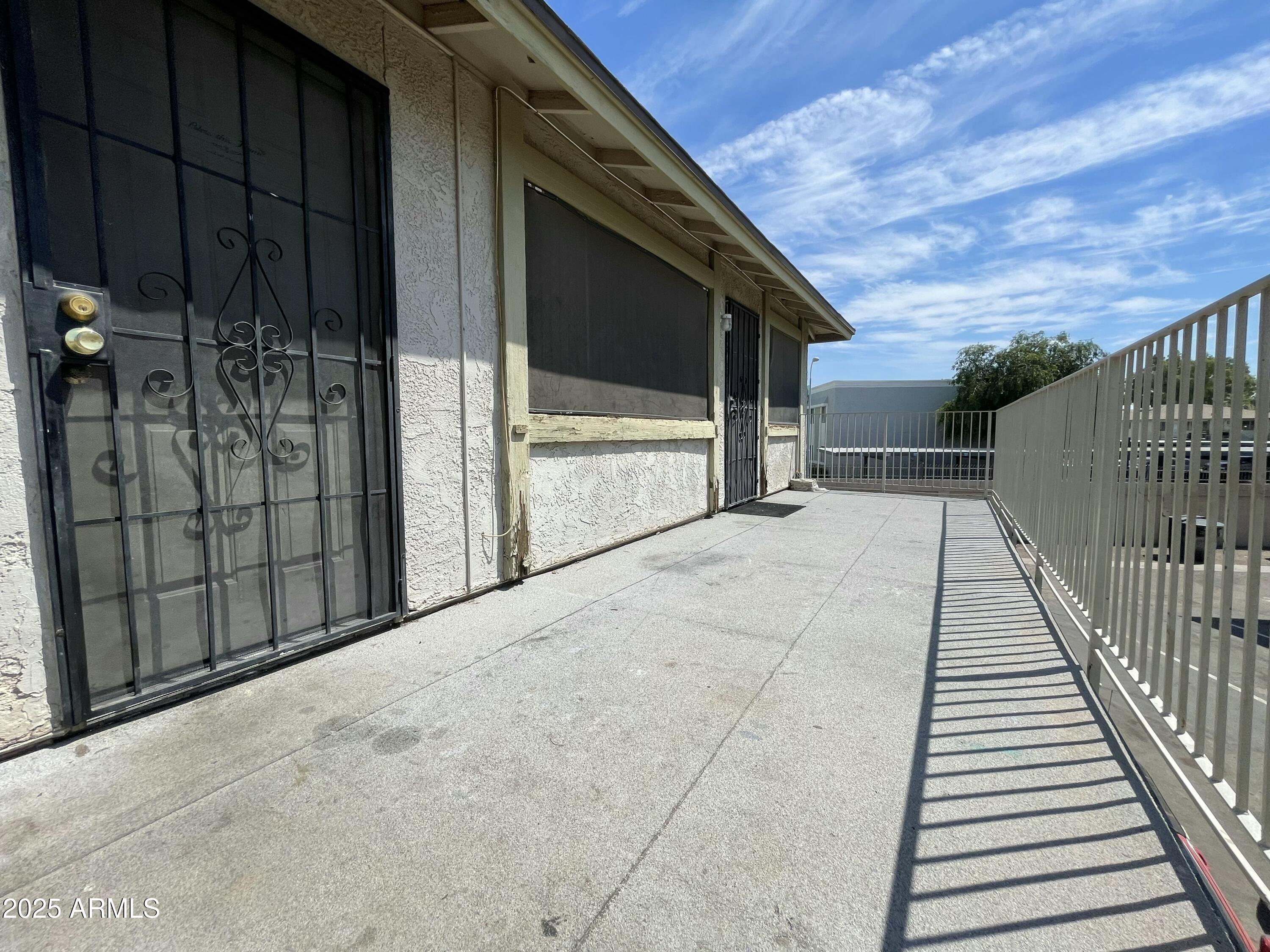 3364 West Harmont Drive Phoenix, AZ 85051 - Photo 24 of 39 a view of backyard with small cabin