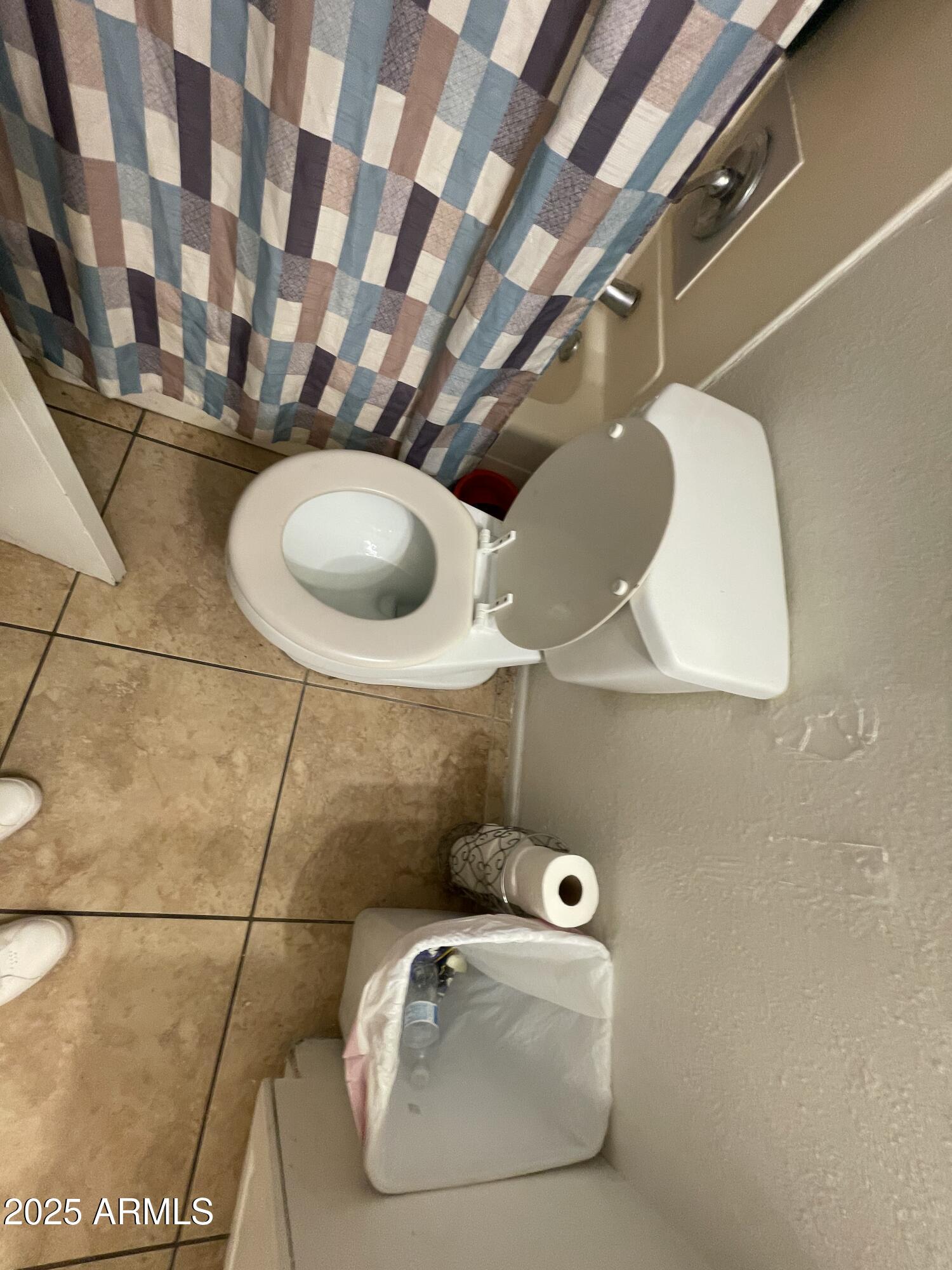 3364 West Harmont Drive Phoenix, AZ 85051 - Photo 31 of 39 a bathroom with a sink and mirror