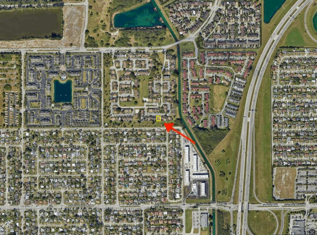 14250 Southwest 283rd Street Homestead, FL 33033 - Photo 3 of 4 a view of wooden door