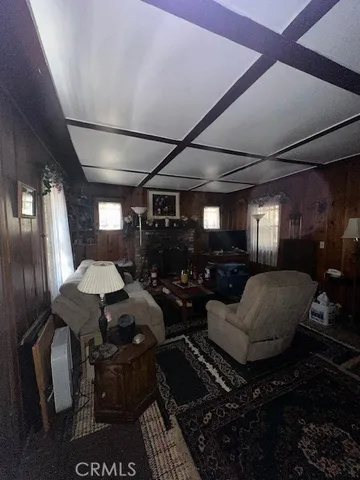 a bathroom with a toilet and a mirror