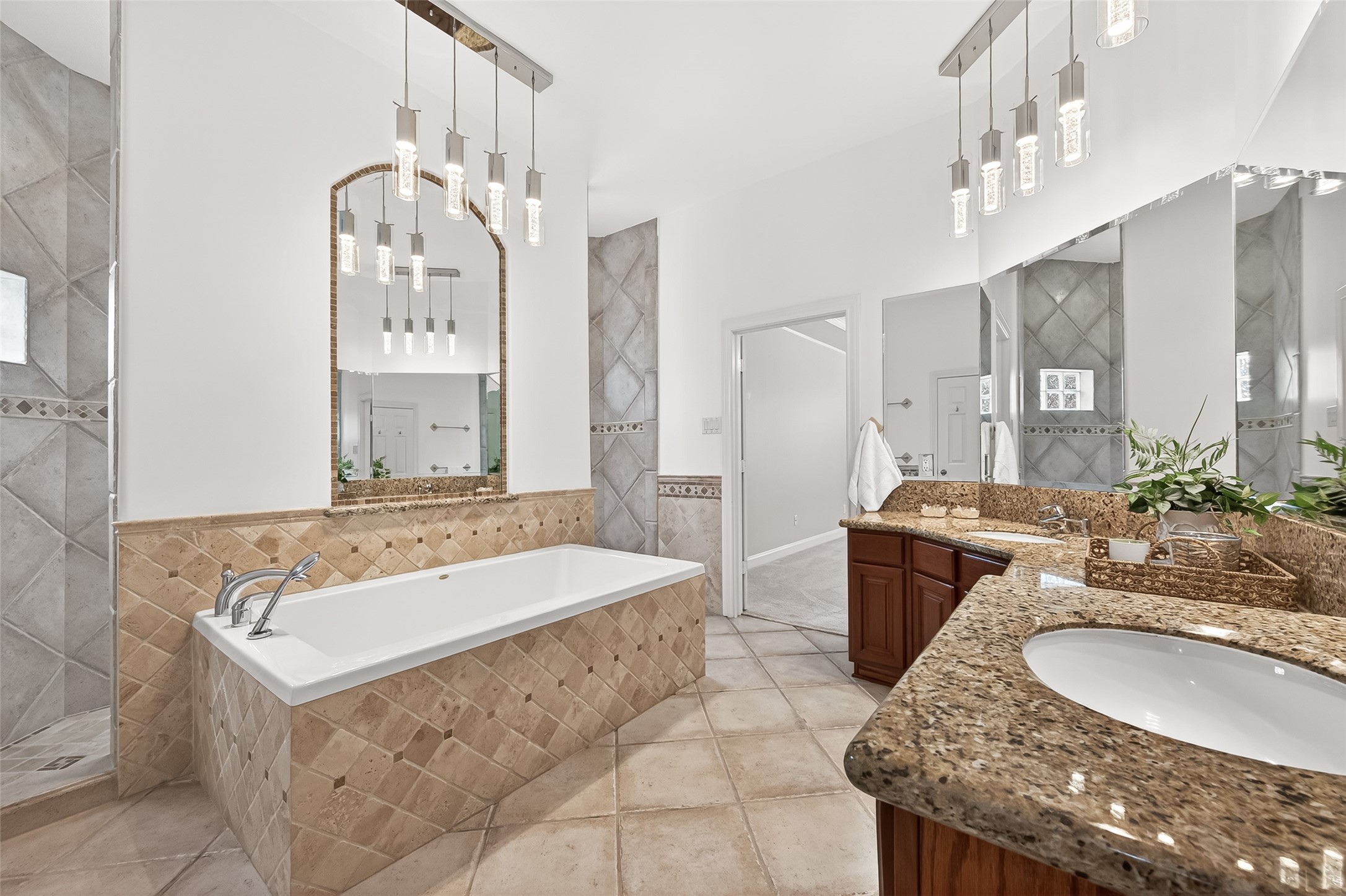 4203 Deforest Ridge Circle Katy, TX 77494 - Photo 24 of 50 The spa experience can begin with a soak in the oversized soaking tub...