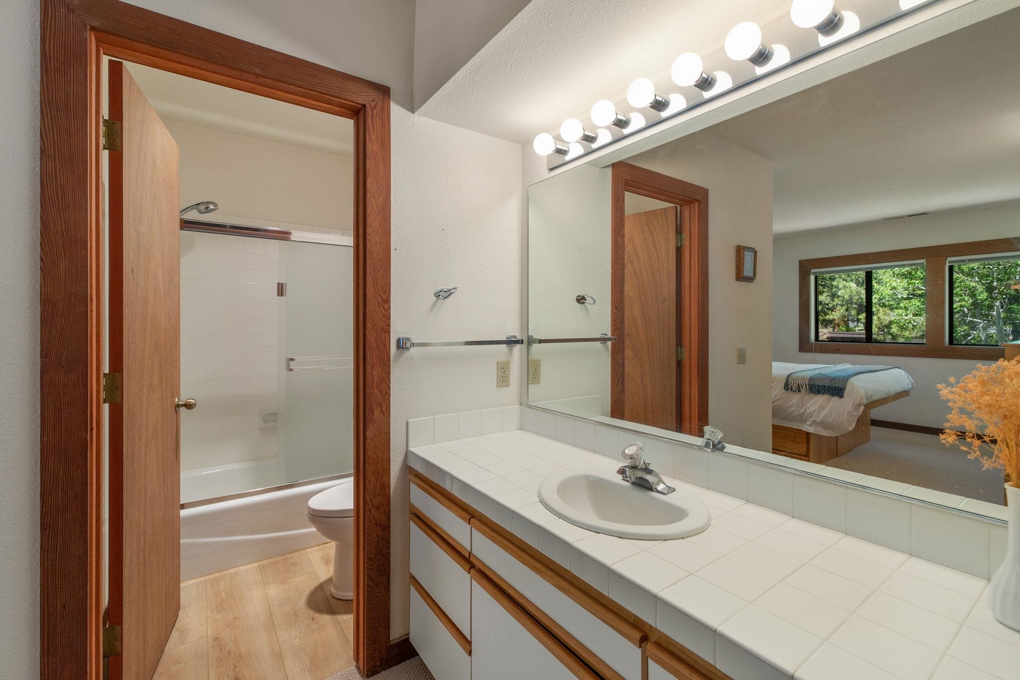 1591 Olympic Vly Road, Unit 29 Olympic Valley, CA 96146 - Photo 16 of 28 a bathroom with a sink and a mirror