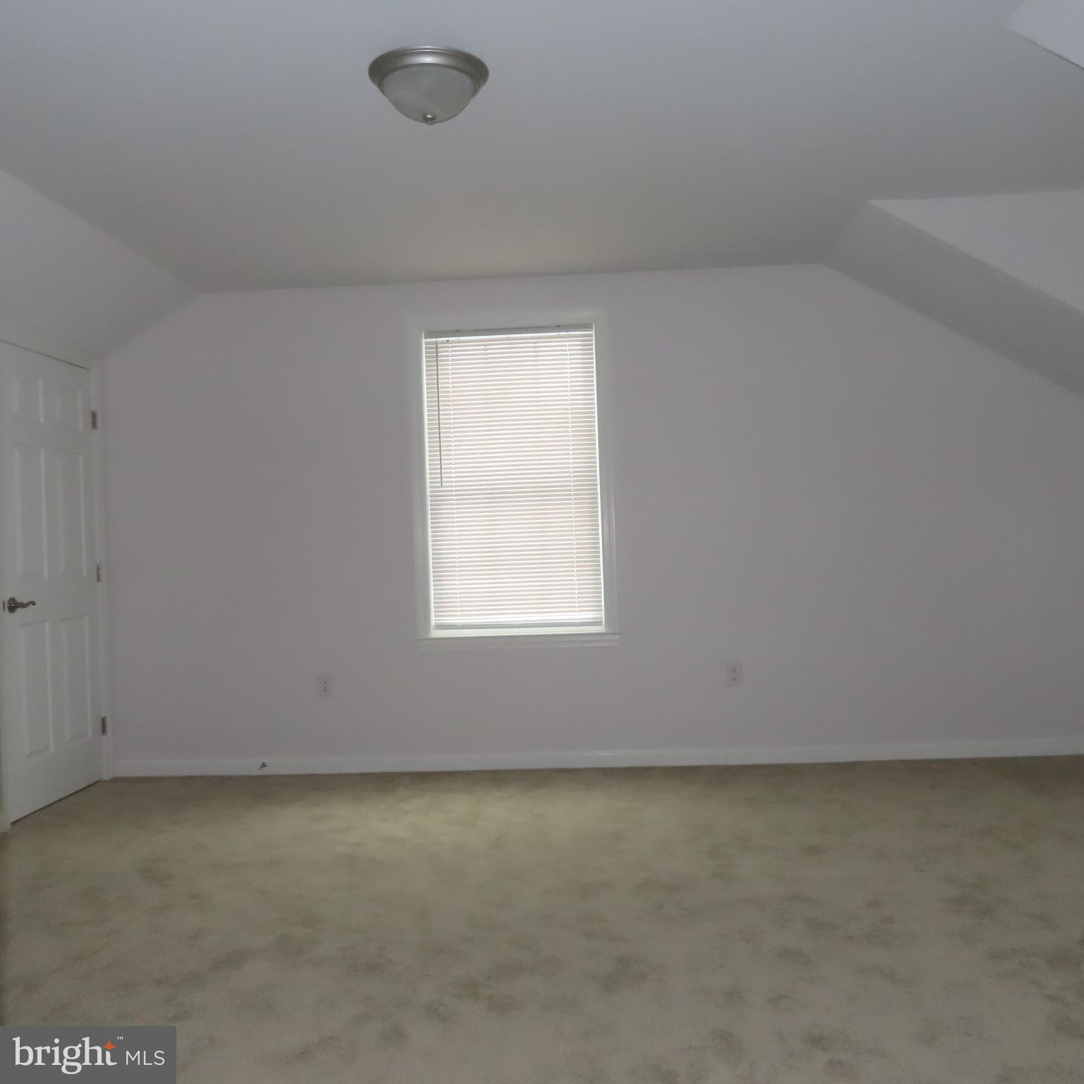 5237 Rolling Road, Unit H Chambersburg, PA 17202 - Photo 13 of 36 an empty room with a window