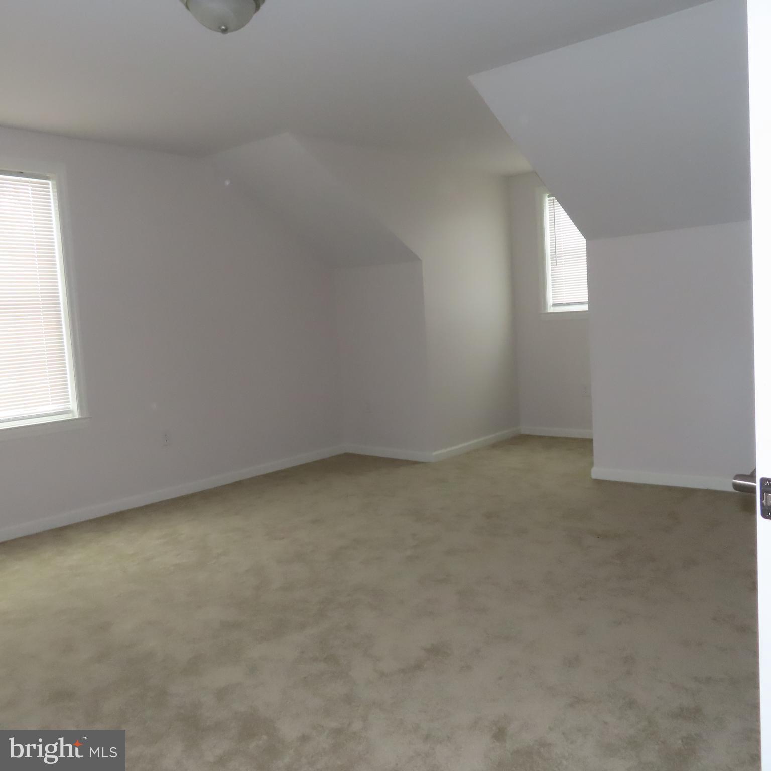 5237 Rolling Road, Unit H Chambersburg, PA 17202 - Photo 15 of 36 an empty room with windows