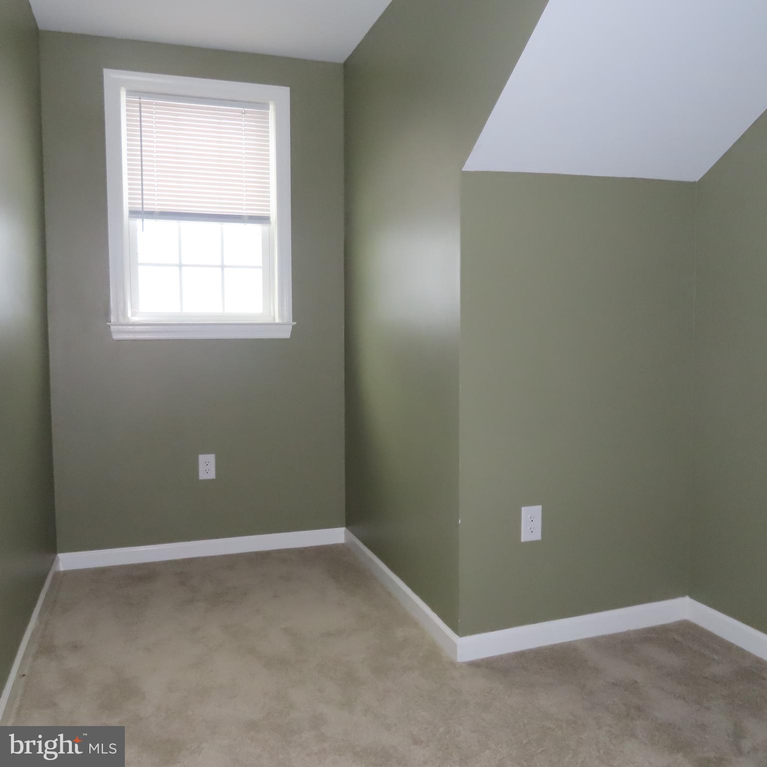 5237 Rolling Road, Unit H Chambersburg, PA 17202 - Photo 19 of 36 an empty room with a window