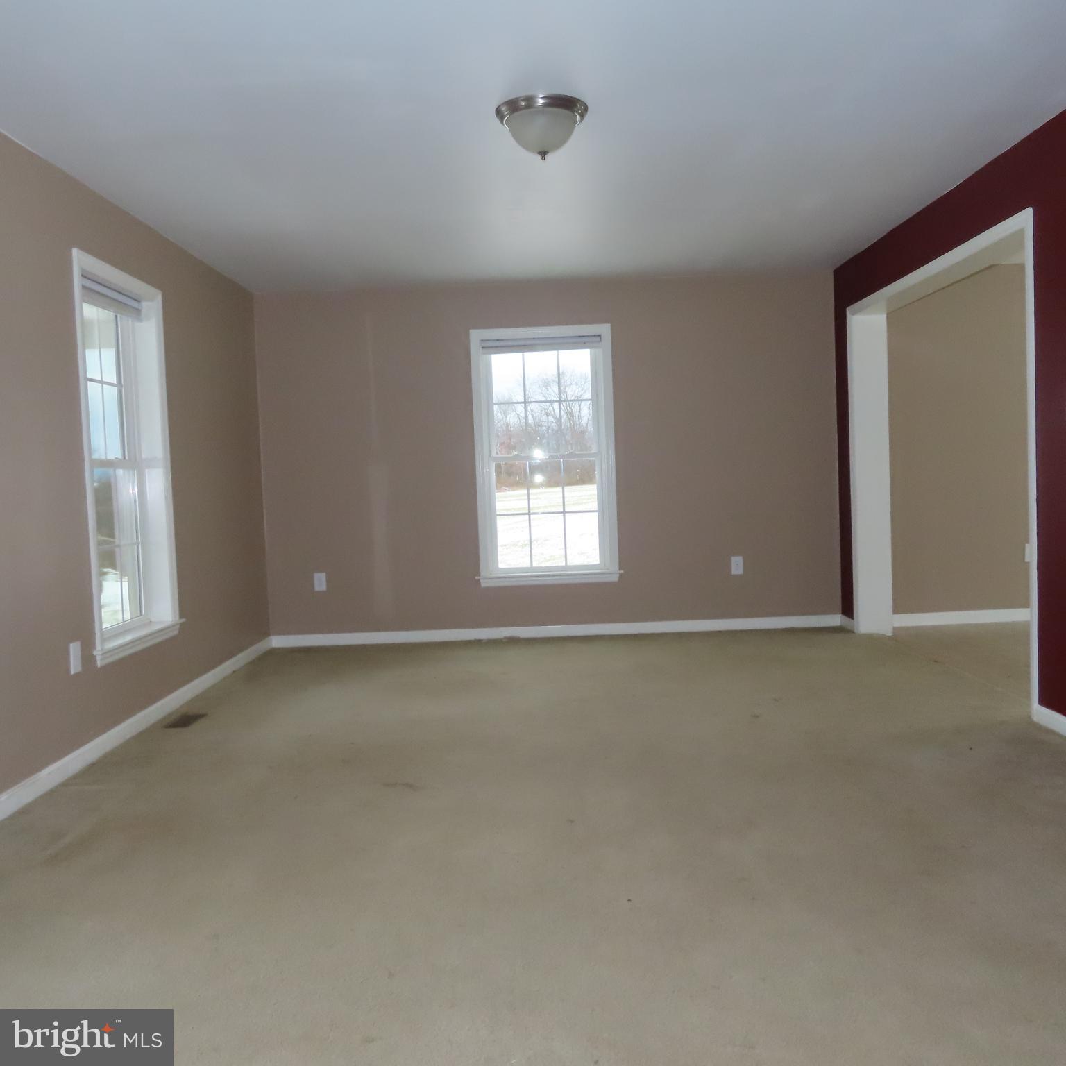 5237 Rolling Road, Unit H Chambersburg, PA 17202 - Photo 2 of 36 an empty room with a window