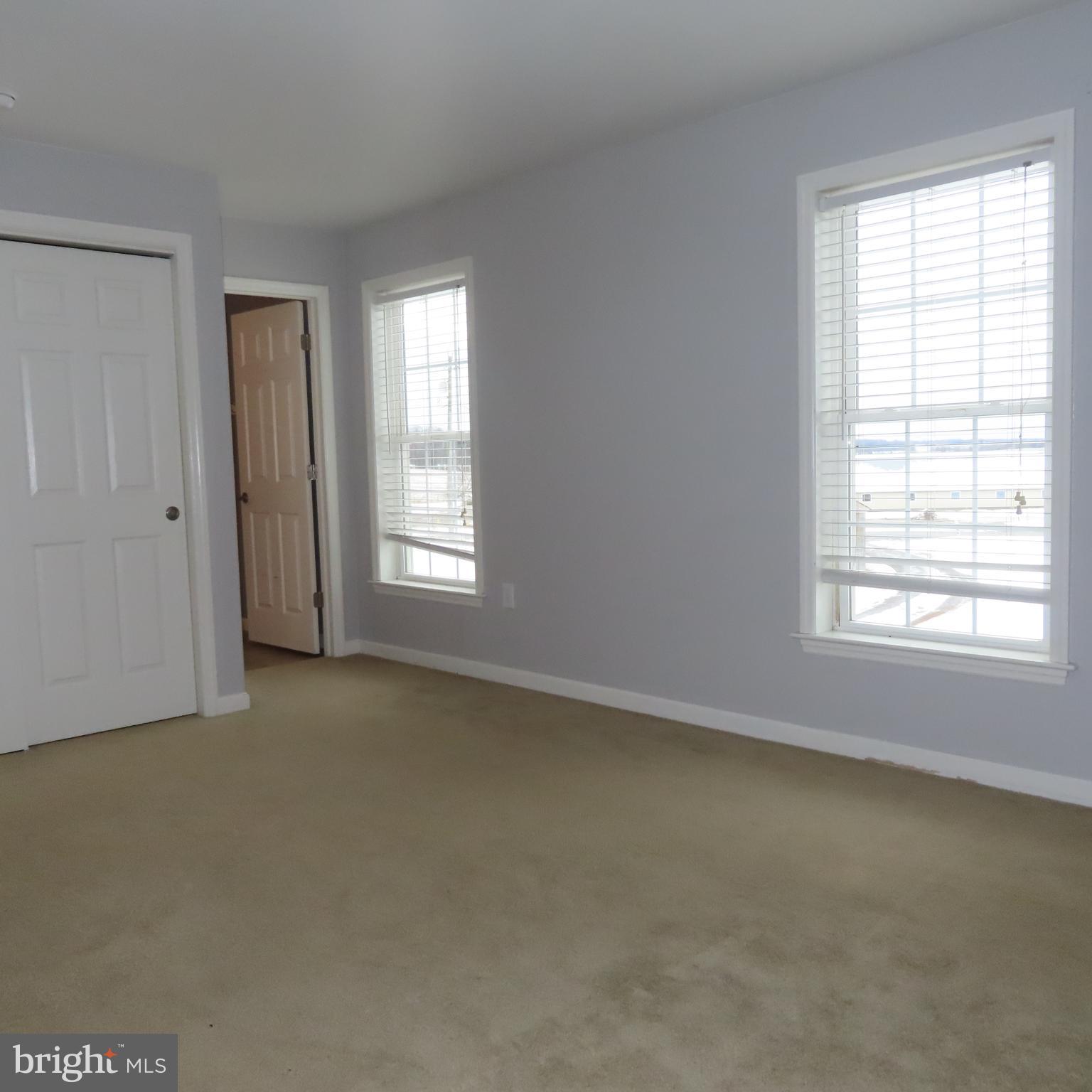 5237 Rolling Road, Unit H Chambersburg, PA 17202 - Photo 24 of 36 an empty room with a window