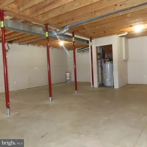 a view of a room with wooden walls