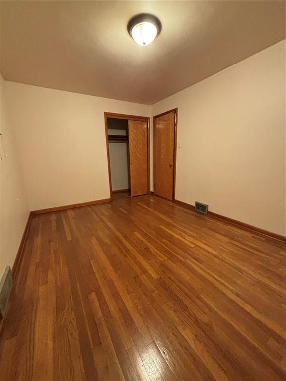 156 Terrace Drive Monongahela, PA 15063 - Photo 19 of 24 a view of an empty room with wooden floor and a window