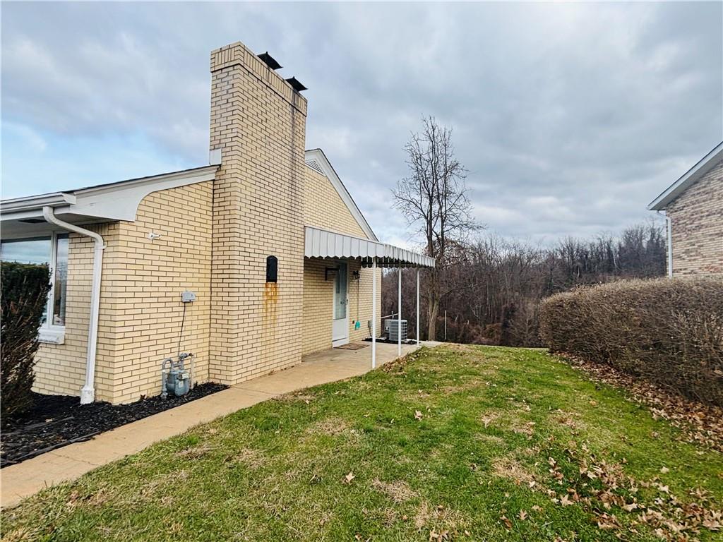 156 Terrace Drive Monongahela, PA 15063 - Photo 4 of 24 a front view of a house with a yard