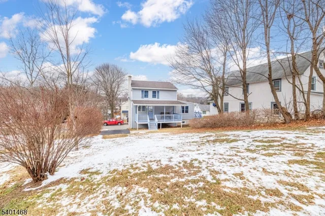 a view of street with large trees