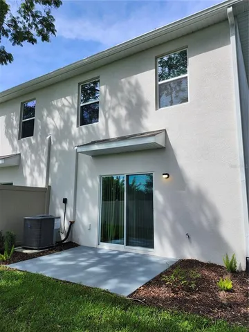a view of a city street with a building