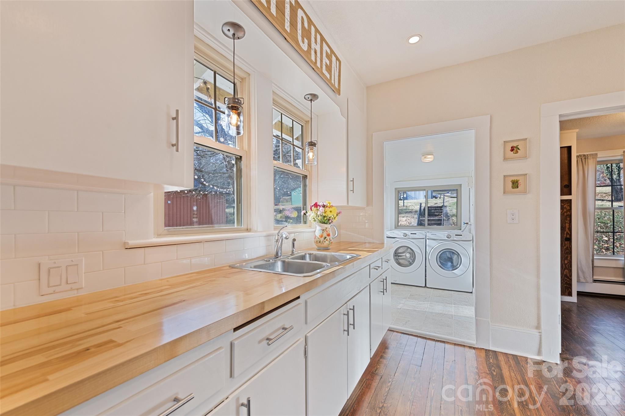57 Fiddle Drive Canton, NC 28716 - Photo 15 of 35 a spacious bathroom with a sink and a mirror