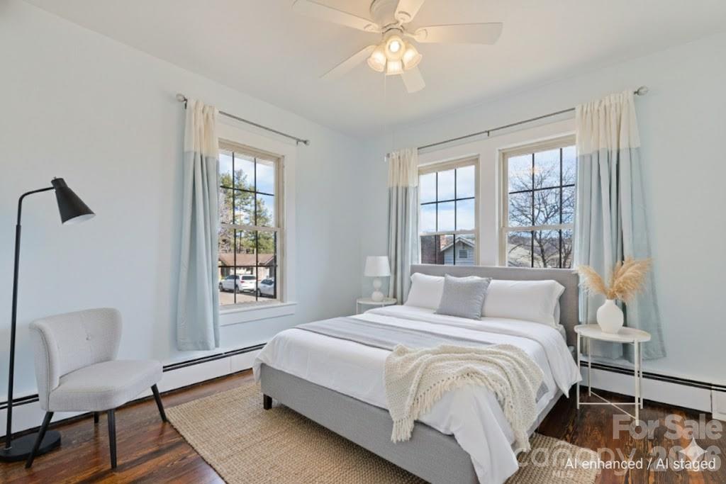 57 Fiddle Drive Canton, NC 28716 - Photo 22 of 35 a bedroom with a large bed and a window