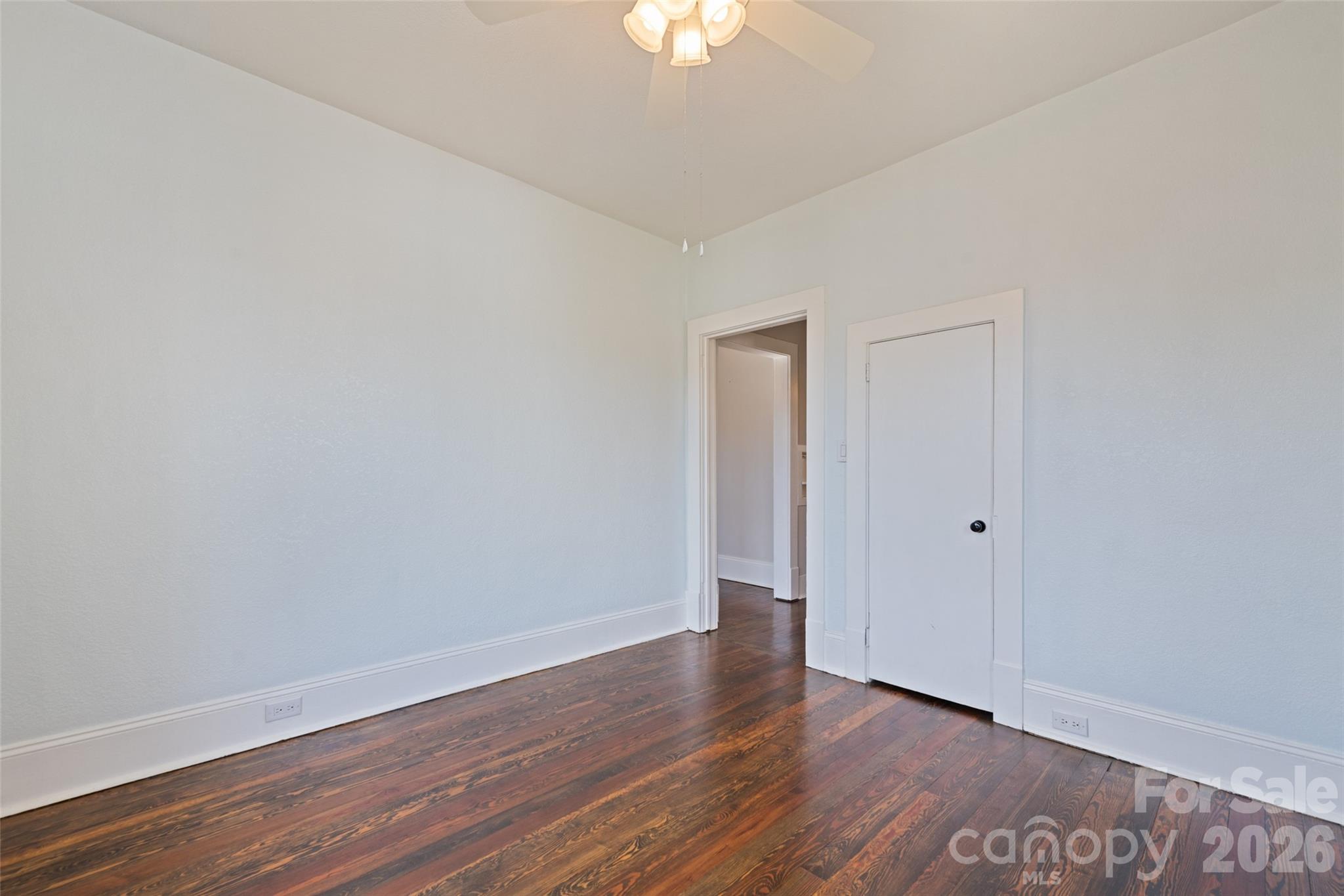57 Fiddle Drive Canton, NC 28716 - Photo 30 of 35 a view of an empty room with wooden floor