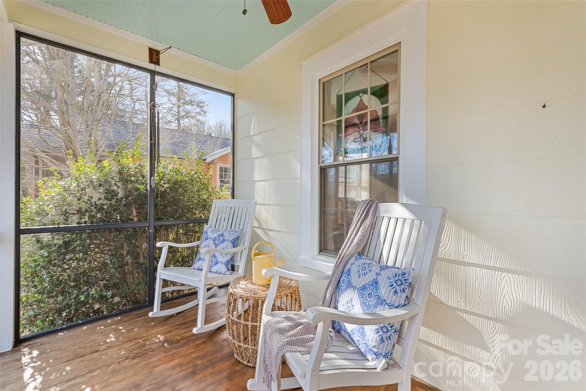 57 Fiddle Drive Canton, NC 28716 - Photo 4 of 35 a view of a dining room with furniture window and wooden floor