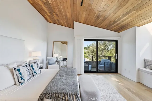 a bathroom with a double vanity sink mirror and shower