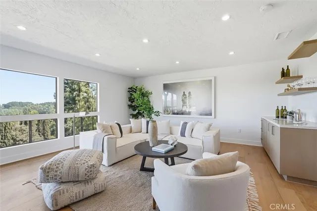 a bedroom with a bed and couch