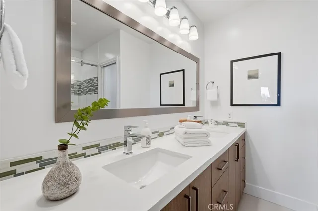 an aerial view of a house with a garden