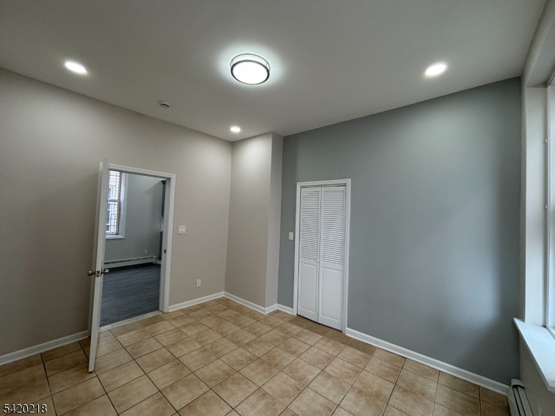 127 Fulton Street Elizabeth Port, NJ 07206 - Photo 15 of 21 a view of an empty room