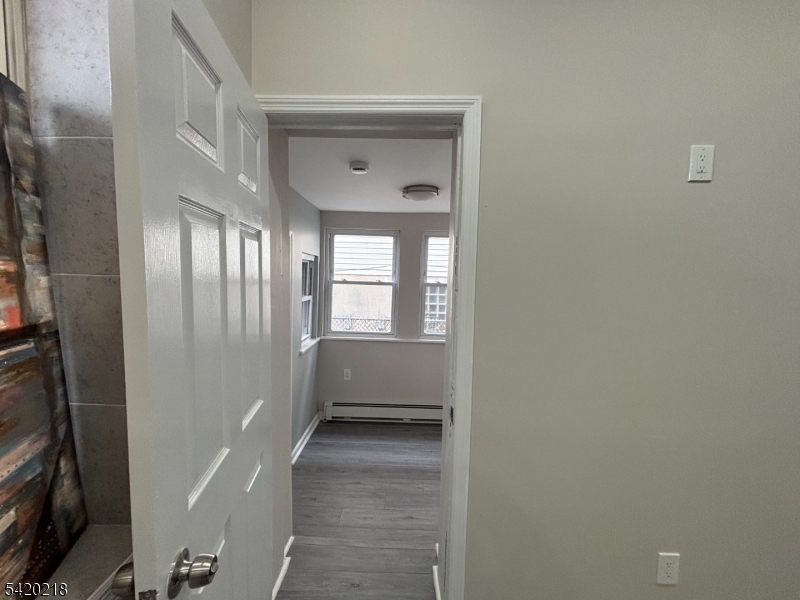 127 Fulton Street Elizabeth Port, NJ 07206 - Photo 16 of 21 a view of entryway with a hallway