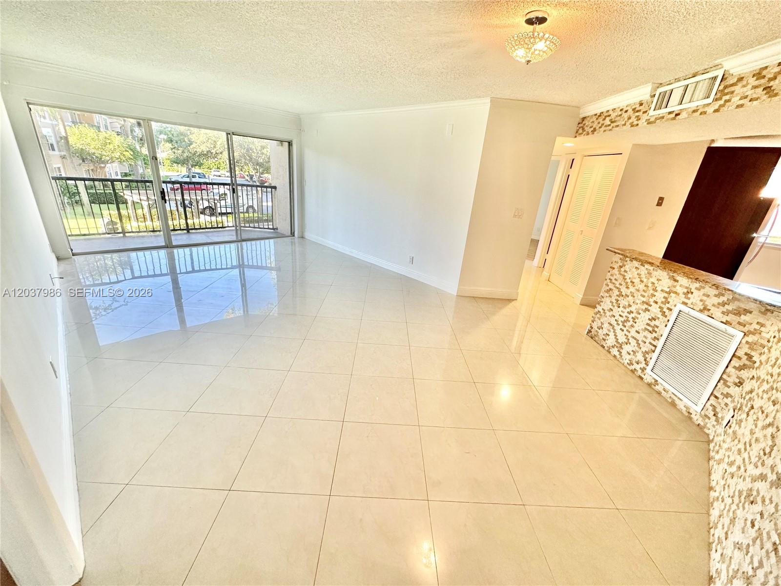 8955 Wiles Road, Unit 208 Coral Springs, FL 33067 - Photo 3 of 29