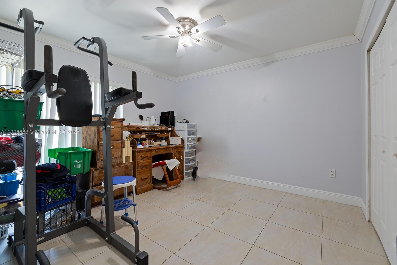 7401 Southwest 82nd Street, Unit 109S Miami, FL 33143 - Photo 15 of 21 a view of a room with gym equipment