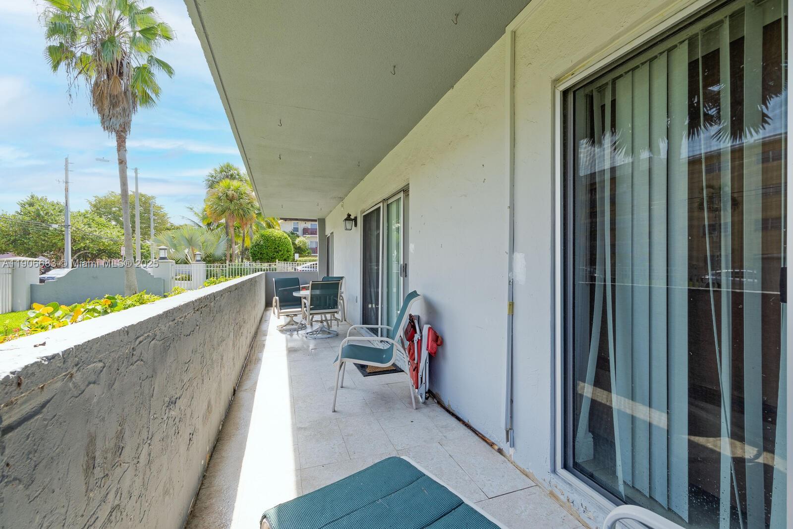 7401 Southwest 82nd Street, Unit 109S Miami, FL 33143 - Photo 17 of 21 a view of balcony and patio