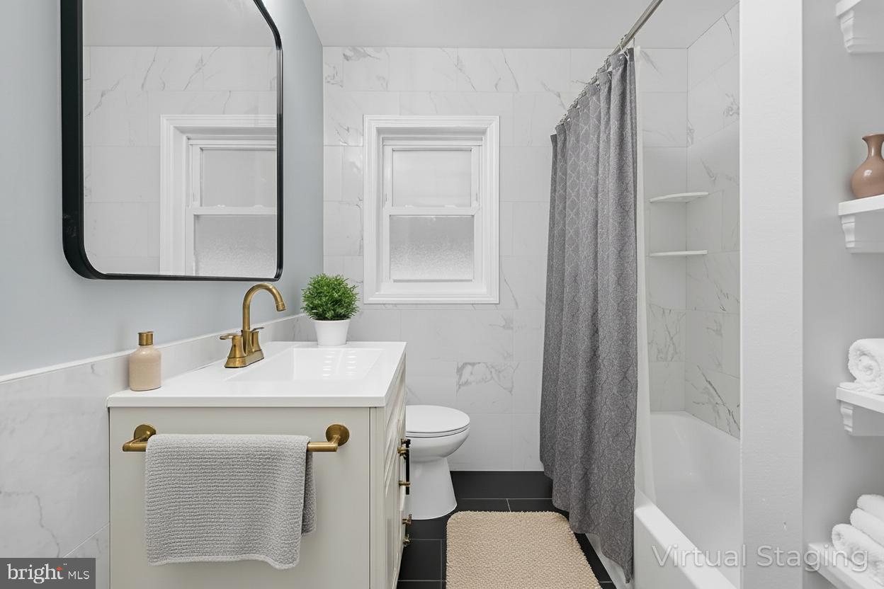 17 Ranchwood Drive Ewing, NJ 08618 - Photo 12 of 33 a bathroom with a sink toilet and mirror