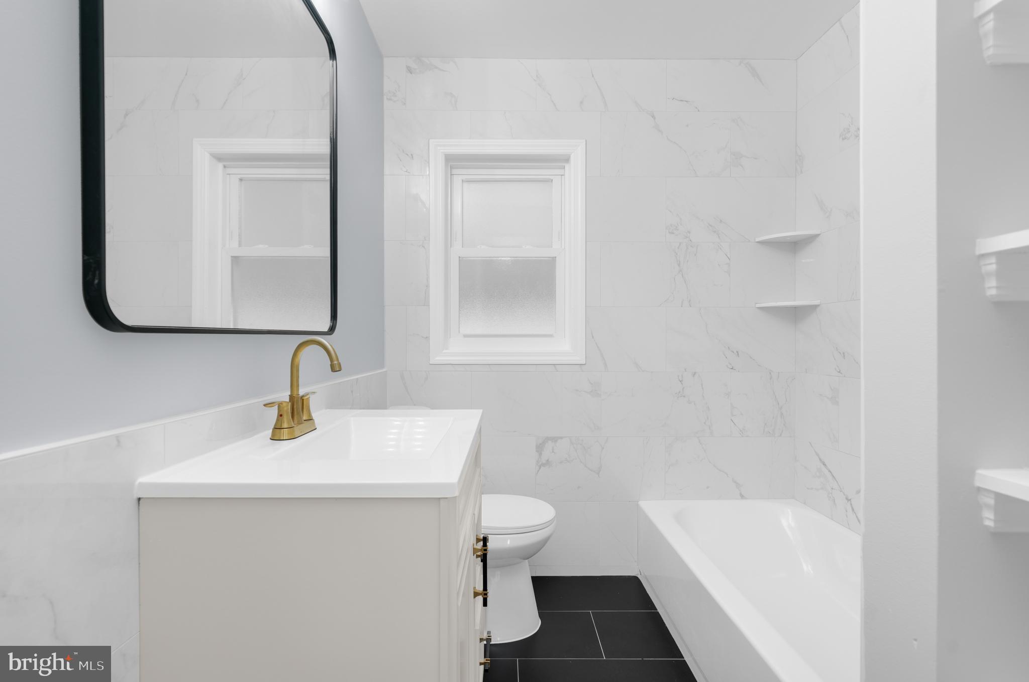 17 Ranchwood Drive Ewing, NJ 08618 - Photo 13 of 33 a bathroom with a sink toilet and shower