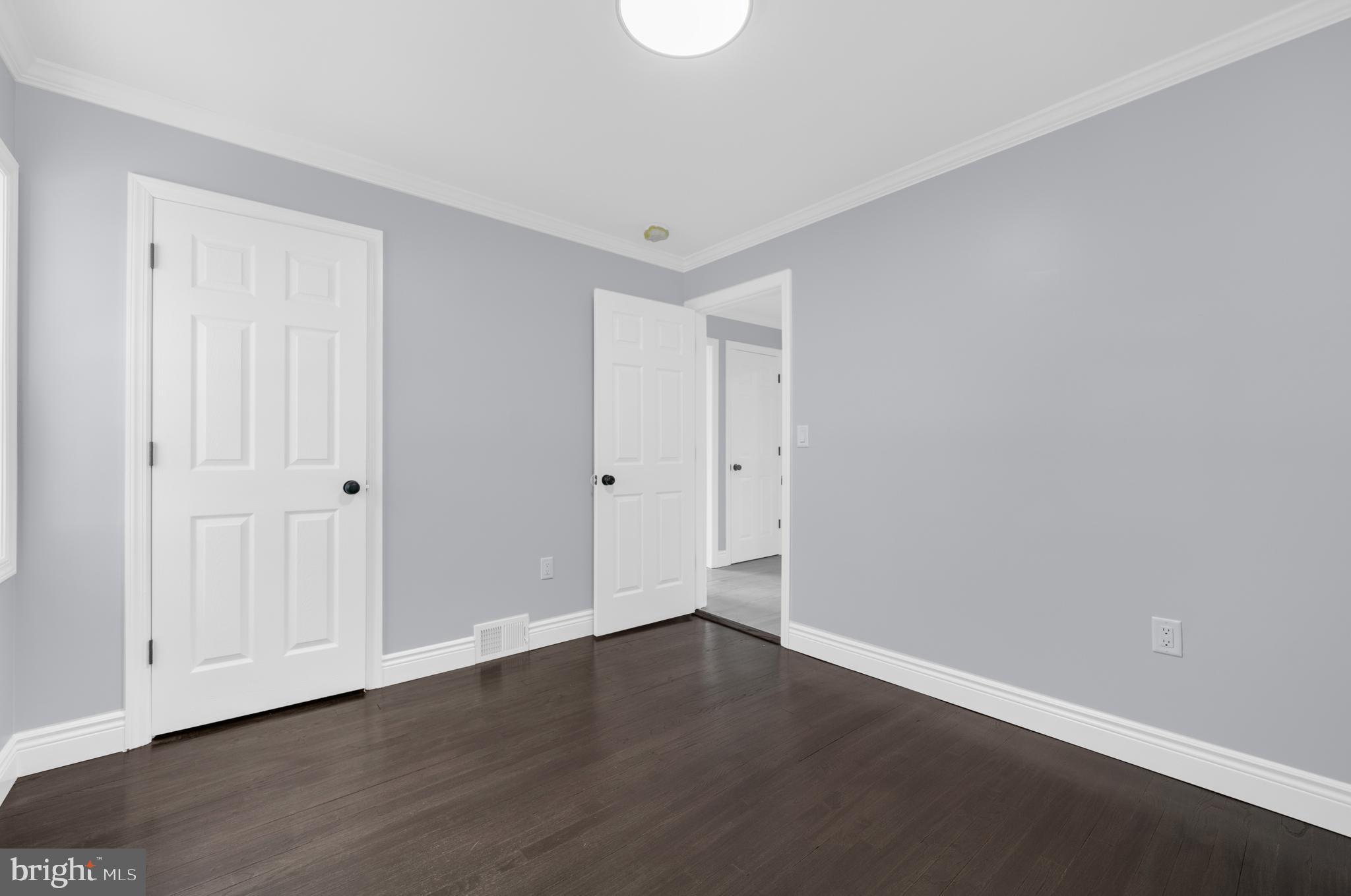 17 Ranchwood Drive Ewing, NJ 08618 - Photo 16 of 33 a view of an empty room with wooden floor
