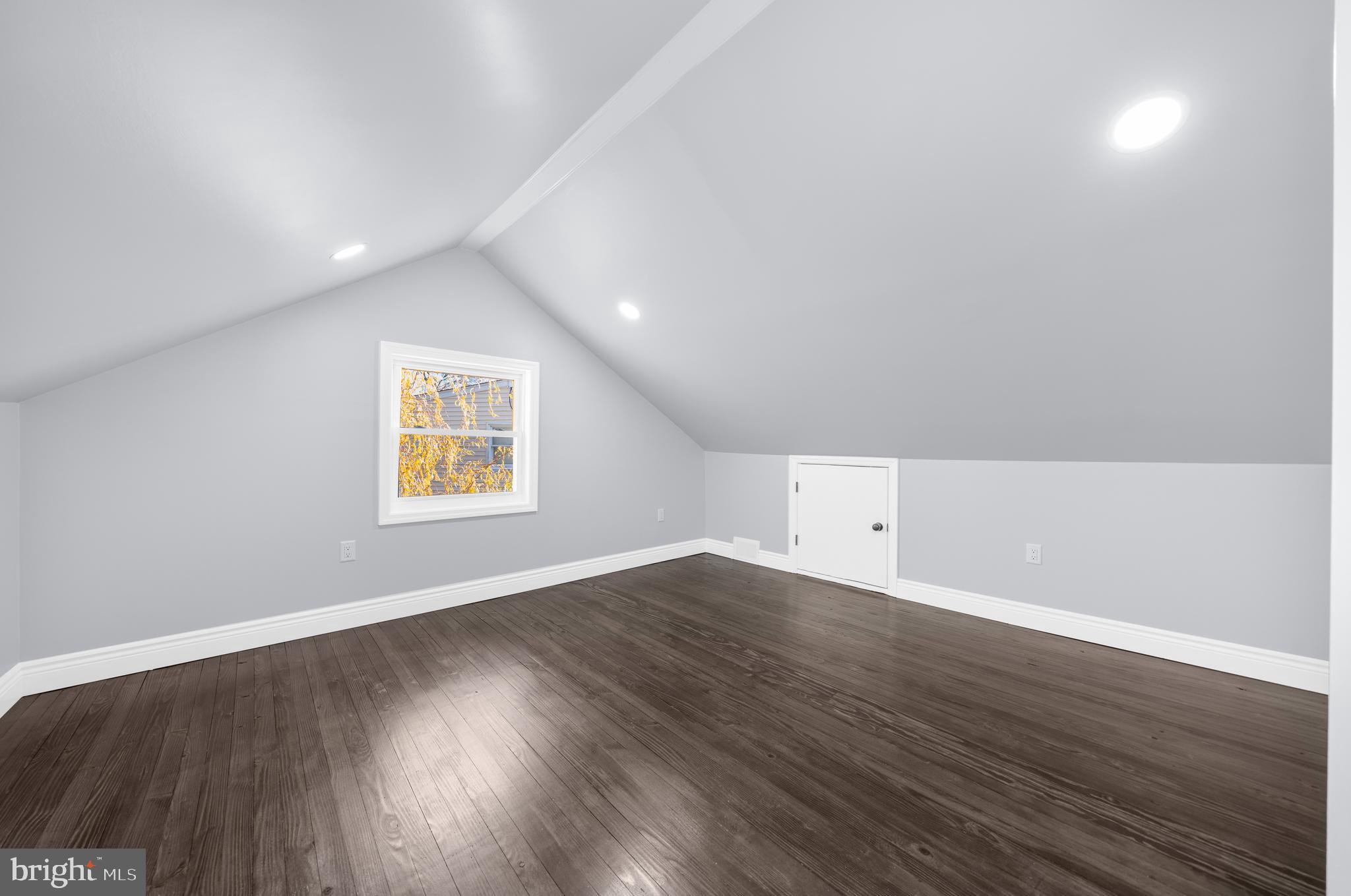 17 Ranchwood Drive Ewing, NJ 08618 - Photo 20 of 33 an empty room with wooden floor and windows