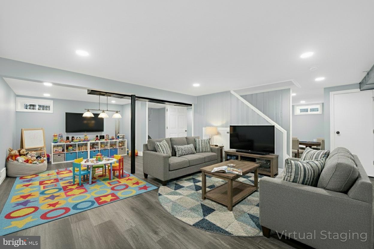 17 Ranchwood Drive Ewing, NJ 08618 - Photo 21 of 33 a living room with furniture and a flat screen tv