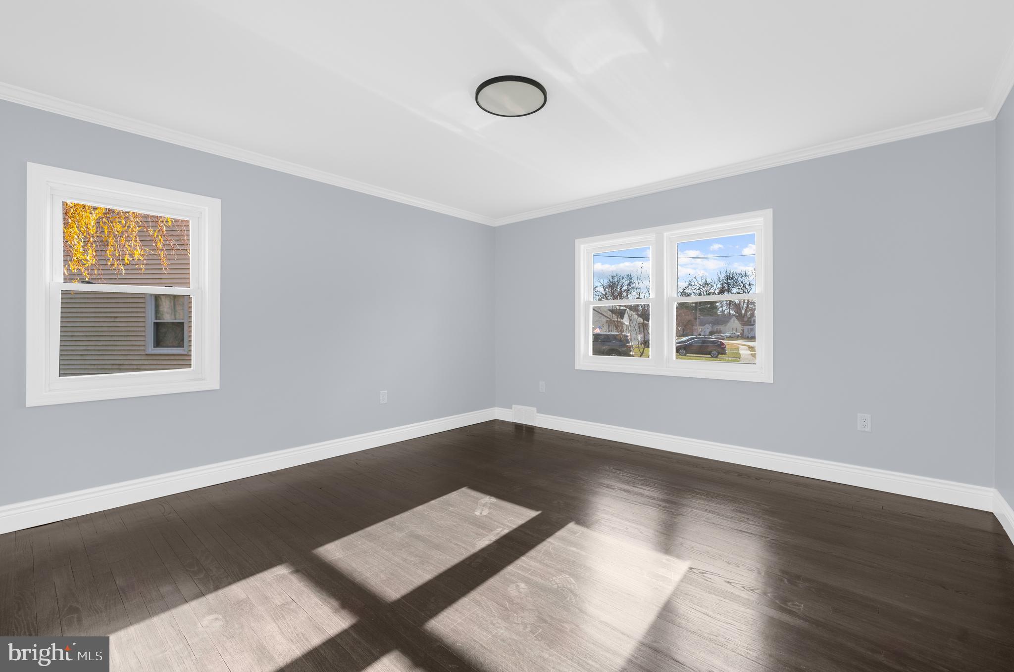 17 Ranchwood Drive Ewing, NJ 08618 - Photo 10 of 33 a view of a room with wooden floor and window