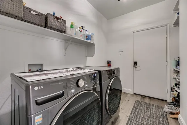a utility room with dryer and washer