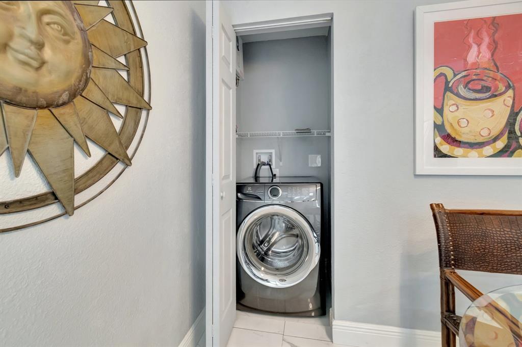 710 Southeast 3rd Avenue Delray Beach, FL 33483 - Photo 20 of 31 a view of walk in closet with clothes and shoes